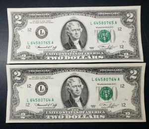 Zwei aufeinanderfolgende Serien 1976 ausgefallene Zwei Dollar Scheine 64/64 Buchstütze und Seq 64/65! - Bild 1 von 2