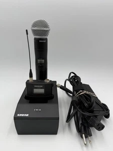 Cargador de acoplamiento Shure SBC220 2 bahías con paquete de cuerpo Shure ULXD1 y micrófono ULXD2 - Imagen 1 de 4