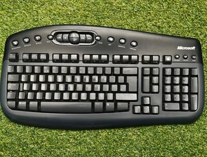 Microsoft 1014 Wireless Multimedia Keyboard 1.1 (untested) - Picture 1 of 3