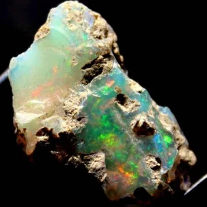 Piedra preciosa áspera de ópalo etíope 100 % natural puro de 11,80 quilates 14X22X9 mm ST-223 - Imagen 1 de 8