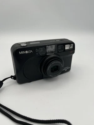 Cámara fotográfica compacta Minolta Freedom Action Zoom 90 fecha 35 mm probada con bate Foto 1 de 4