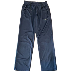Pantalones de Entrenamiento Nike Dri-FIT Azul Marino Tejidos Calce Relajado Ligeros Forrados en Malla Talla L - Imagen 1 de 5