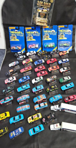 Nascar Matchbox Vintage hard to find cars/trucks Lot with stands and some sealed