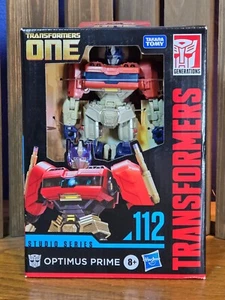 Transformers Generations Studio Series 112 | TF One OPTIMUS PRIME | Deluxe Class - Picture 1 of 6