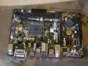 Placa madre ASRock FM2A58M-HD+ 1.03 Socket FM2+ VGA DVI HDMI Audio funcionando - Imagen 1 de 12