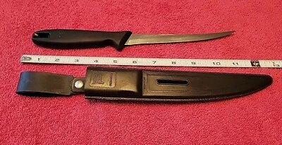 Cuchillo Fiskars para deshuesar filetes de acero inoxidable de 6" con funda de plástico y afilador incorporado Foto 1 de 4