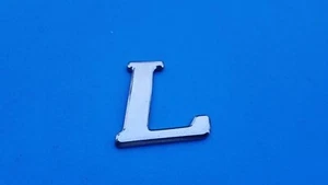 96 97 98 99 00 01 02 03 04 05 TOYOTA RAV4 L REAR EMBLEM LOGO BADGE SYMBOL OEM A4 - Picture 1 of 3