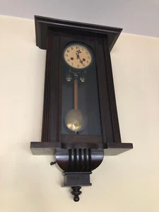 ANTICO OROLOGIO A PENDOLO JUNGHANS 1900 DA MURO H 75 X L 40 P 16 FUNZIONANTE - Foto 1 di 6