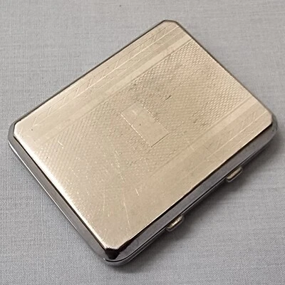 VINTAGE CHROME PLATED COMBINATION POWDER COMPACT AND CIGARETTE CASE - Image 1 of 4