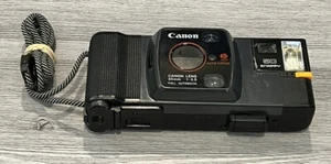 Canon Snappy 50 nero 35 mm flash integrato fotocamera pellicola automatica completa - SPEDIZIONE GRATUITA - Foto 1 di 5