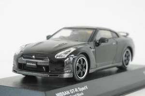 KYOSHO 1:43 NISSAN GT-R SpecV ULTIMATE OPARL NEGRO 1008 piezas. - Imagen 1 de 6