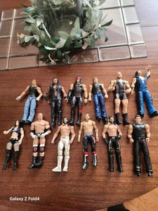 12 WWE Restling Figures Variety Gently Used - Picture 1 of 6