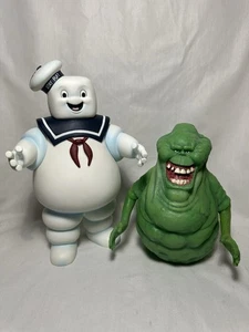 Diamond Select Ghostbusters Vinyl Büste Bank Stay Puft + Glow In The Dark Slimer - Bild 1 von 5