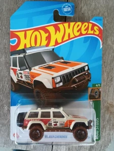 HOT WHEELS 2023 TREASURE HUNT SERIES-MUD STUDS 95' JEEP CHEROKEE-MOMC - Picture 1 of 4