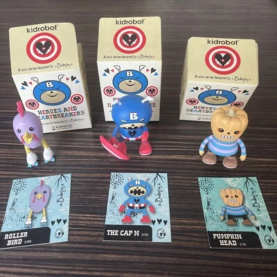 Kidrobot x 3- Designed By Ryan Bubnis, Roller Bird, The Cap N, Pumpkin Head - Image 1 of 4