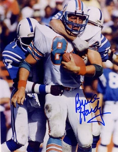 Foto autografiada a mano por Bruce Hardy de 8" X 10" de fútbol americano de los Miami Dolphins - Imagen 1 de 3