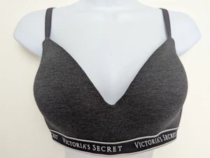 Reggiseno Victoria's Secret grigio t-shirt leggermente foderato senza fili 36D nero bianco logo - Foto 1 di 10