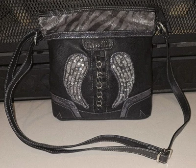Bolso Bandolera Miss Me Mujer Cuero Negro/Plateado Tachonado Adornado Ala de Ángel Foto 1 de 4