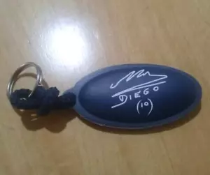 DE COLECCIÓN RARO ARGENTINA MARADONA AUTÓGRAFO FIRMADO LLAVERO LOJACK PUBLICIDAD - Imagen 1 de 4