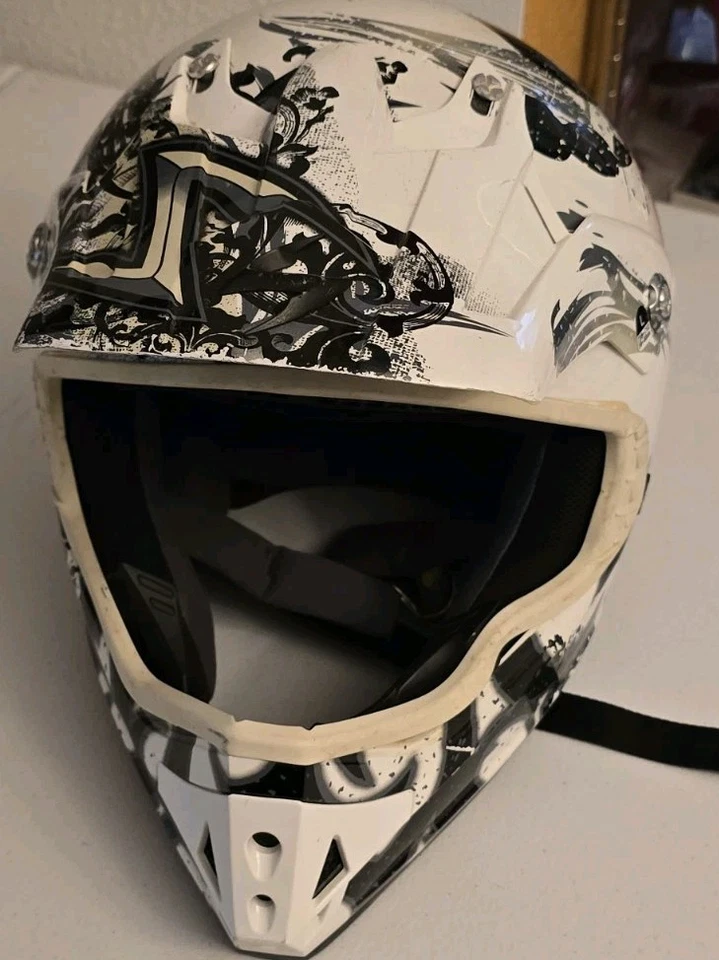 Casco rígido de motocicleta Scorpion King blanco calaveras negras  Foto 1 de 3