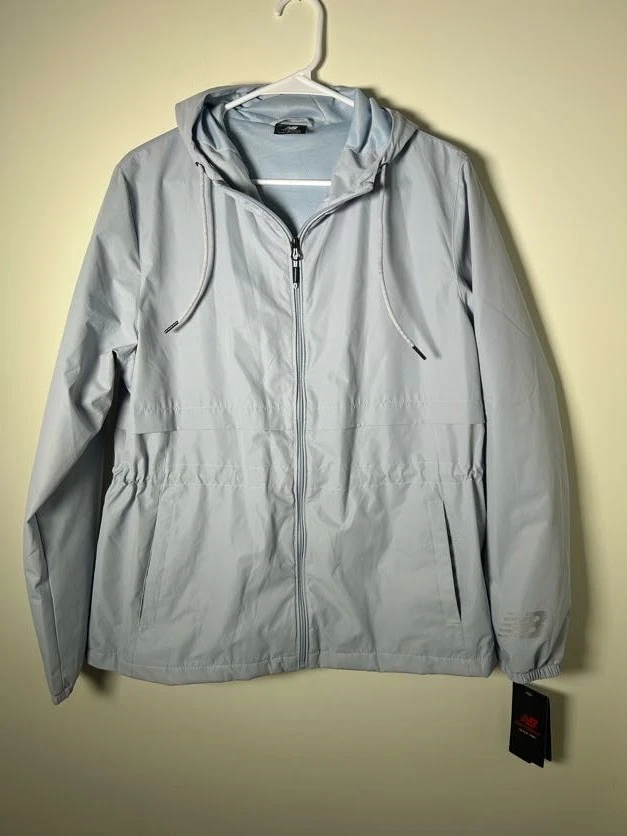 Cortavientos New Balance XL resistente al agua azul bebé para mujer - Nuevo con etiquetas Foto 1 de 4