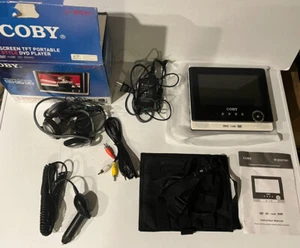 PARTS OR REPAIR Coby TF-DVD7105 - 7in Widescreen Portable DVD Player With Cords - Picture 1 of 3