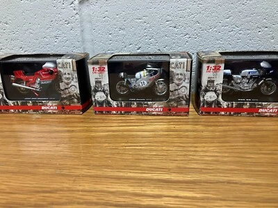 3 Ducati super detailed diecast motorcycles by NewRay 1:32 - Image 1 of 4
