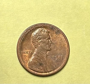 1987 Lincoln Penny (L) in Liberty In rim, (I) In God We Trust is missing. - Picture 1 of 2