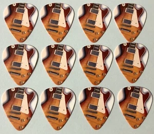 12 pcs GUITAR Gibson Les Paul Guitar Picks - Hot Picks - 12 pics - Picture 1 of 2