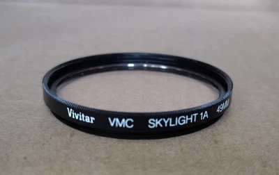 Vivitar VMC Skylight 1A 49mm Lens Filter Made in USA - Image 1 of 2