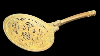 Cuchara islámica de latón con mango de cabeza de león con figura de animal Asia Central antigua Foto 1 de 4