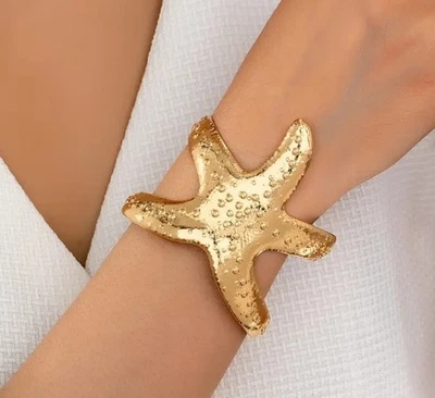 Thick starfish cuff bracelets - Image 1 of 2
