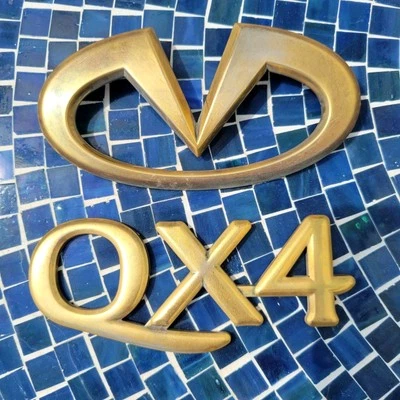 Infiniti 2001 2002 QX4 GOLD Plated Rear Genuine emblems - image 1 of 3