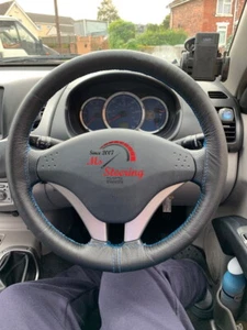 CUBIERTA DE CUERO VOLANTE PARA MITSUBISHI L200 DOBLE COSTURA AZUL CLARO - Imagen 1 de 2