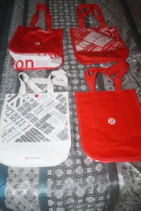 SET BESTEHEND AUS 4 KLEINEN EINKAUFSTASCHEN LULULEMON ROT & WEISS - Bild 1 von 8