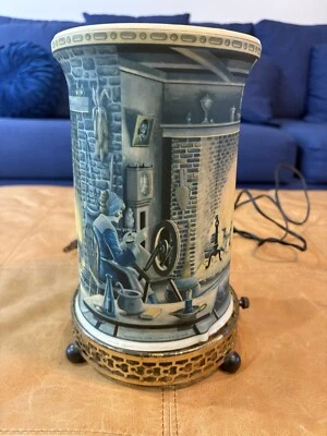 Lámpara de movimiento Econolite rara 1958 forma ovalada acogedora chimenea gato y familia hogar Foto 1 de 4