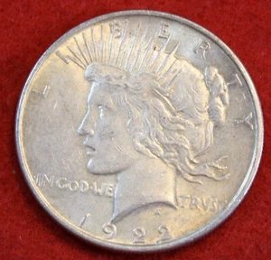 1922-P Peace Dollar 90% Silver Coin High Grade PE202 - Picture 1 of 2
