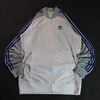 CHAQUETA DEPORTIVA BLANCA PEQUEÑA Y2K/2000S ADIDAS HIPHOP A RAYAS CREMALLERA COMPLETA Foto 1 de 4