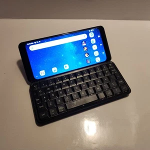 Planet Computers ASTRO SLIDE 5G Phone QWERTY UK KEYBOARD RARE - Photo 1 sur 4
