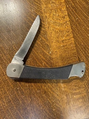 Cuchillo de pesca PUMA Angler 870 negro con bloqueo hoja de acero inoxidable (8311) Foto 1 de 4