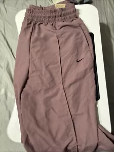 Nike Woman’s Standard Fit Mid Pants Pink - Picture 1 of 7