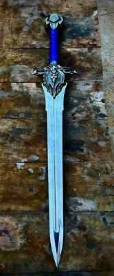 Espada hecha a mano World of Warcraft Guardia Real Alianza Cabeza de León Ventormenta espada Foto 1 de 4