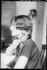 Miss Ethel Hale is shown here using the new electric safety razor - 1925 Photo