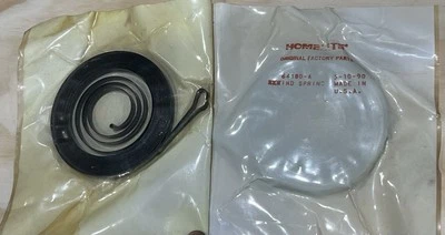 Motosierra Homelite genuina rebobinado retroceso resorte 64180-A nuevo stock antiguo Foto 1 de 3