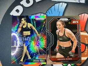 2020-21 Panini Prizm UFC AMANDA NUNES 1ST YEAR PRIZM & SILVER INTANT IMPACT - Picture 1 of 10