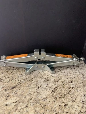 Neumático de repuesto Nissan 350Z 2003-2009 gato genuino 99550-CE86C OEM. Foto 1 de 4