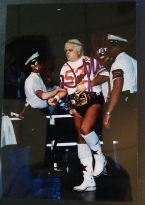 Foto brillante firmada por el campeón de la NWA Dusty Rhodes 4x6 con cinturón NWA Foto 1 de 4