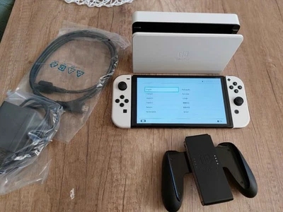 NINTENDO Switch (OLED-Modell) Weiß 64 GB interner Speicher - Bild 1 von 3