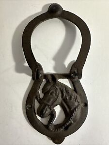 Cast iron horse head and horseshoe door knocker