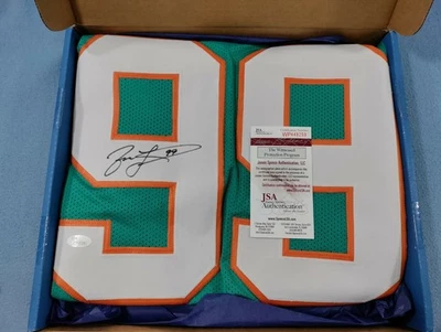 CAMISETA FIRMADA POR JASON TAYLOR DE LOS MIAMI DOLPHINS AUTÓGRAFO CERTIFICADO DE AUTENTICIDAD JSA FÚTBOL AMERICANO NFL Foto 1 de 4